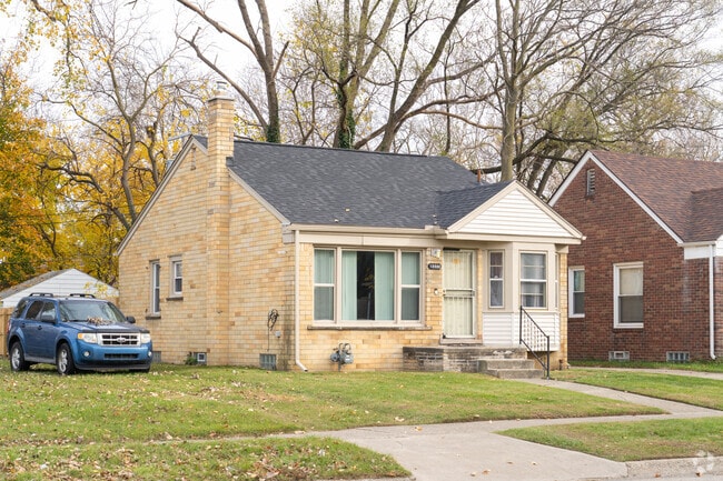 Homes with light colored brick provide pops of color along the streets of Greenfield.