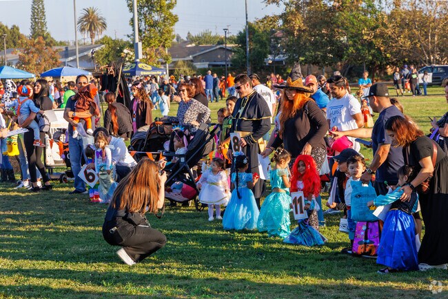 Judging the costumes at the annual Halloween Festival in Stanton Central Park.