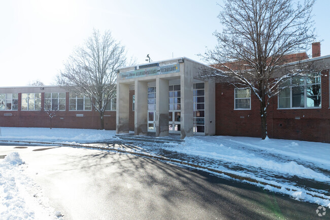 The main entrance of Thomas S O Brien Academy Of Science And Tech.