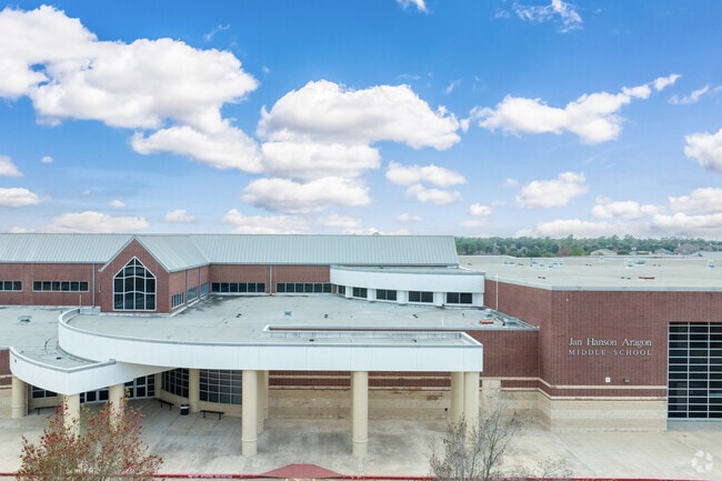 Enter a world of knowledge at Aragon Middle School's inviting facade.
