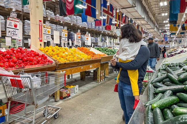 Customers browse produce from around the world at Your DeKalb Farmers Market in Scottdale.