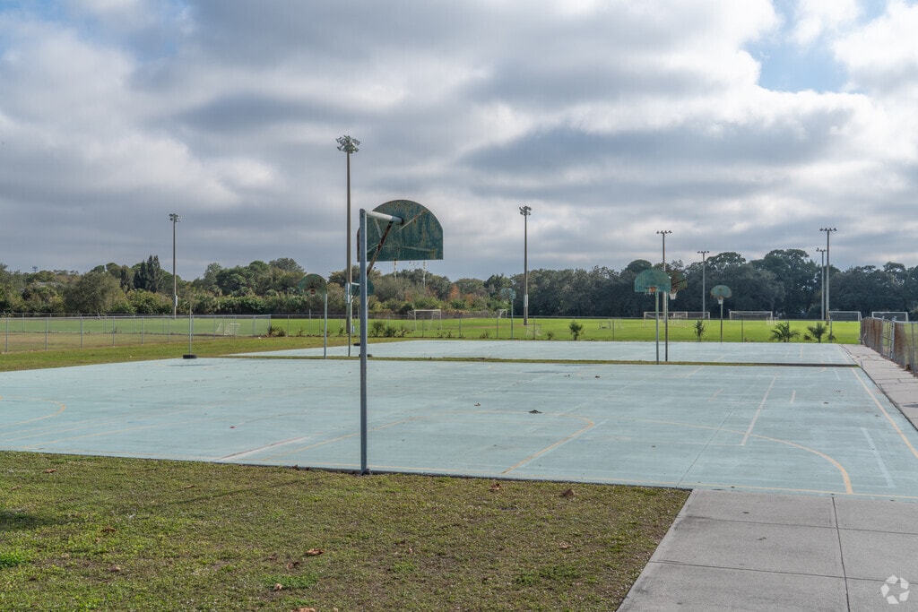 Lanier Elementary School features a basketball court next to the school.