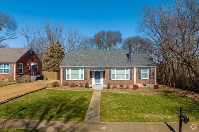 Small single-family homes have well-kept front yards in the Whitebridge neighborhood.