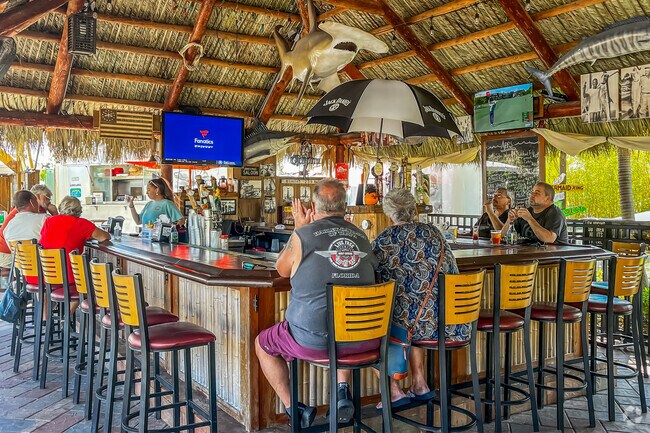 Grab a drink and enjoy tiki vibes with friends at Harbor Master Tiki Grill.