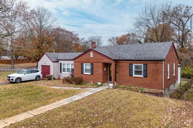 Ranch style homes with modern additions come with large front yards in Northwoods.