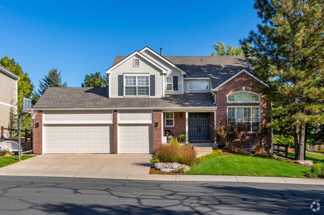 Large, three-car garage houses with half-arch windows can be found in The Farm-Arapahoe.
