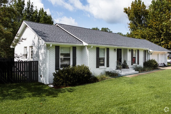 Find beautiful brick ranch-style homes in Rifle Range.