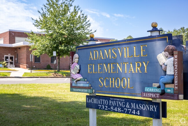 A unique sign at Adamsville Elementary School, a public educational facility in Finderne, NJ.
