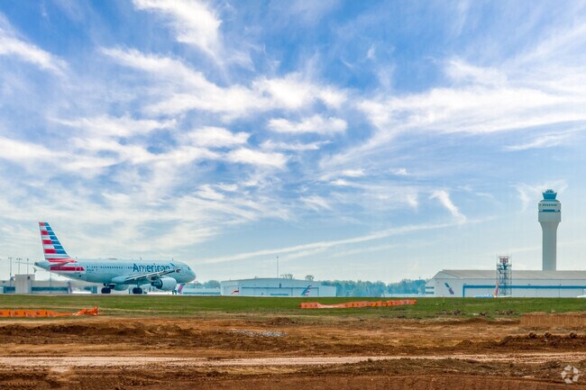 In Dixie-Berryhill, you'll see planes waiting to take off at Douglas International Airport.