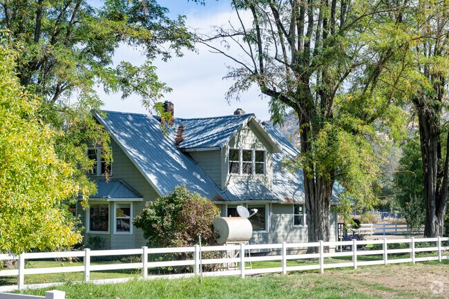 Large homes with white picket fences can be found in the Foots Creek neighborhood.