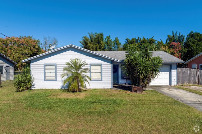 Mature trees often grace Geneva home backyards for shade and privacy