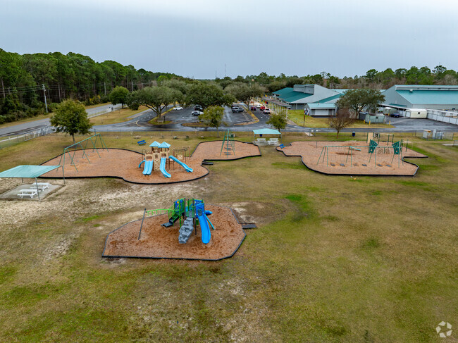 Three of Osceola Elementary School's multiple play areas.