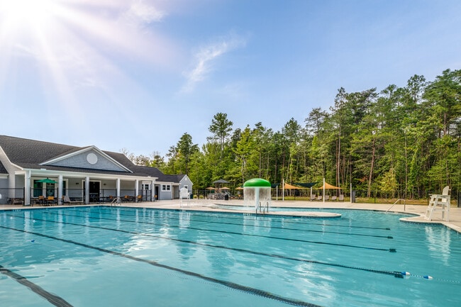 A new pool and clubhouse are an exciting addition to Pendleton! The complex also boasts an outdoor kitchen area and picnic tables.