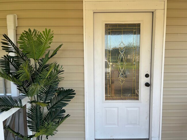Door to A (Front Apartment)