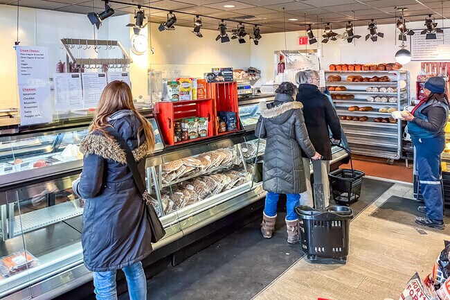 Patrons await their orders at Kaufman's Bagel and Delicatessen in Southwest Skokie.