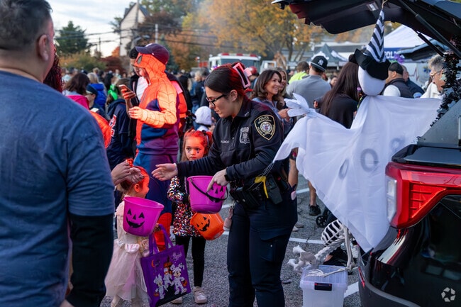 Families meet Eastchester and Tuckahoe police at the Eastchester Truck or Treat.