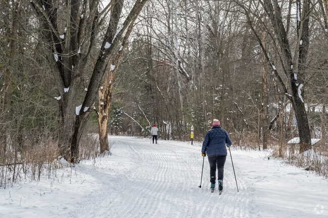 Cross-country skiers access Red Cedar State Trail at Riverside Park.