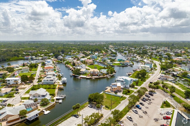 The community of Hudson is full of serene waterways that pass through residential neighborhoods.
