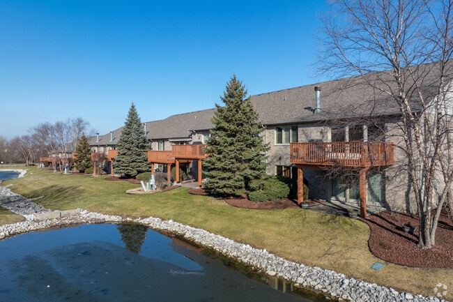 Some townhouses in Central Orland have porches that overlook quaint ponds.