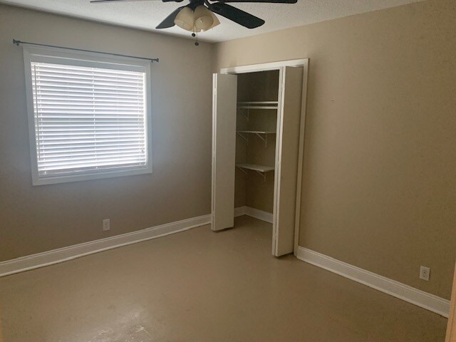 Study with shelving in closet