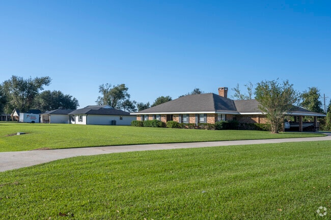 On Country Drive in Bourg most of the homes are ranches of varying styles.