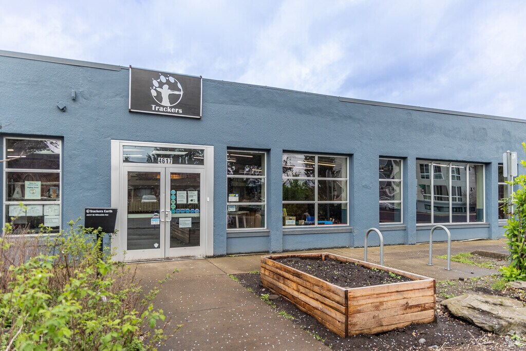 Students dive into naturalist studies at Portland Forest School.