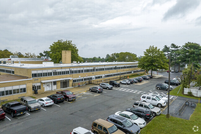 Island Trees High School in Levittown has 716 students in grades 9-12 with a ratio of 11 to 1.