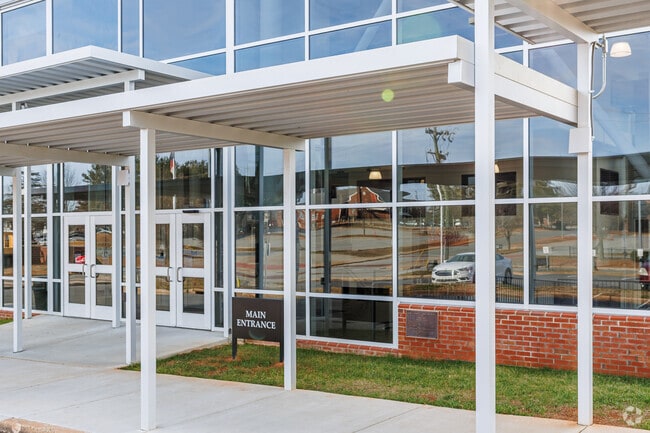 The entrance of J.F. Kennedy High School is welcoming and inviting.