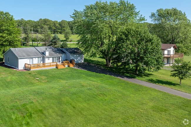 Ranch homes are often on a large green lot in Penn Forest.