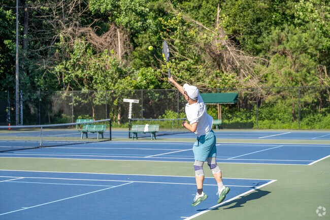 Fine tune your tennis game on the public courts of Mason Mill Park.