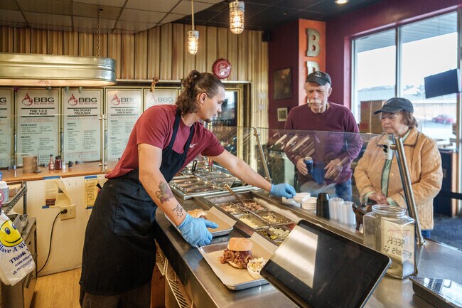 The hard-working crew at Big Black Grill preps some tasty sandwiches in New Stanton.
