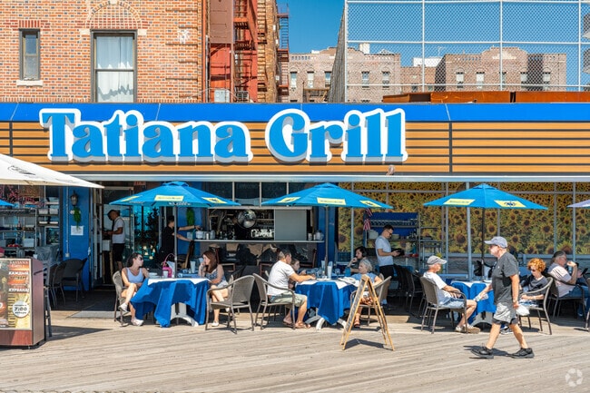 Take on lunch at Tatiana Grill for a fresh meal with boardwalk views along Brighton Beach.