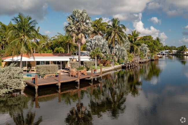 Palm Trees adorn waterfront homes in the Chapel Hill neighborhood of Boynton Beach, FL.