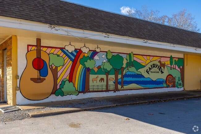 The Fairview mural next to Country  Cafe shows of the lifestyle of the community.