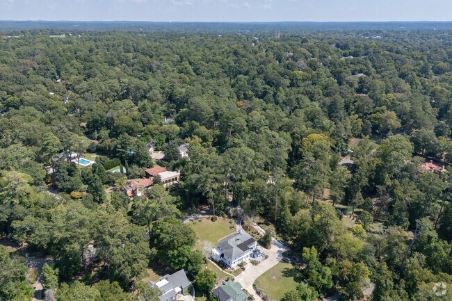 In the Shirley Hills Historic District there are more trees than houses, making it desirable.