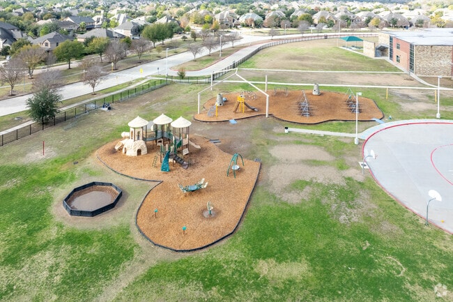 Pope Elementary School's playground beckons with vibrant colors and endless fun.