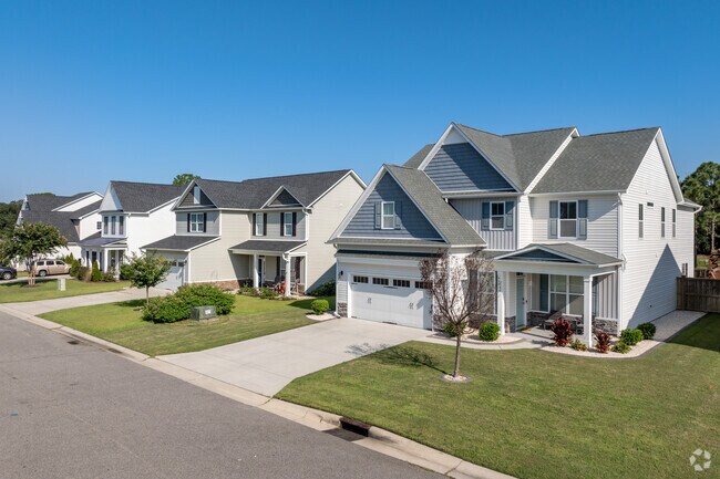 Many of the newer homes in Arrondale are larger traditional style homes.
