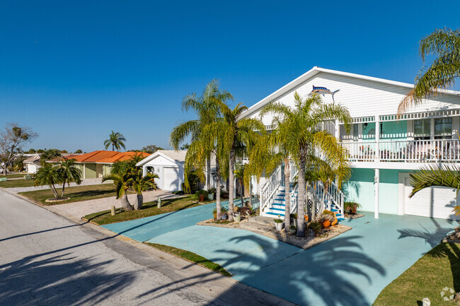 Many Flor-A-Mar homes have beautiful palm trees in their landscaping.