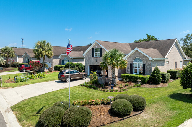Brick Colonial style homes are rare but also available in Beau Rivage.