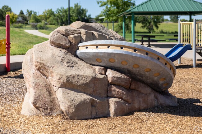 Acres Green's kids can climb on the crashed UFO for a great picture in Altair Park.