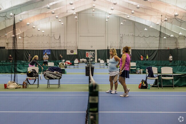 Players can practice tennis year round at the Cooper Park indoor tennis facility.