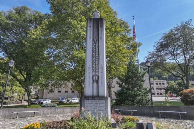 Sit on one of the many benches in Wilmerding Park and enjoy the War Monument on a nice day.