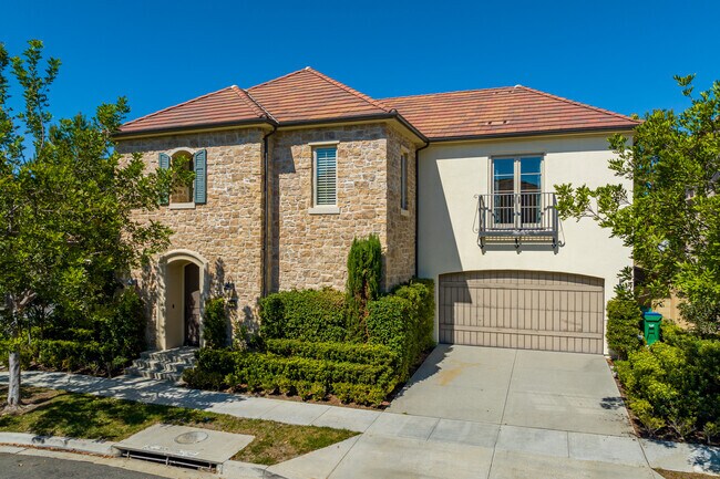 Large Cypress Village homes feature custom stonework that highlight unique design.