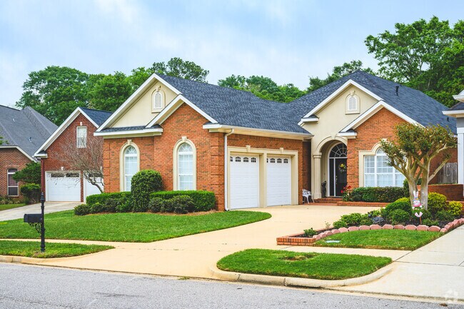 Some Grand Bay homes are newer, Craftsman Style builds.