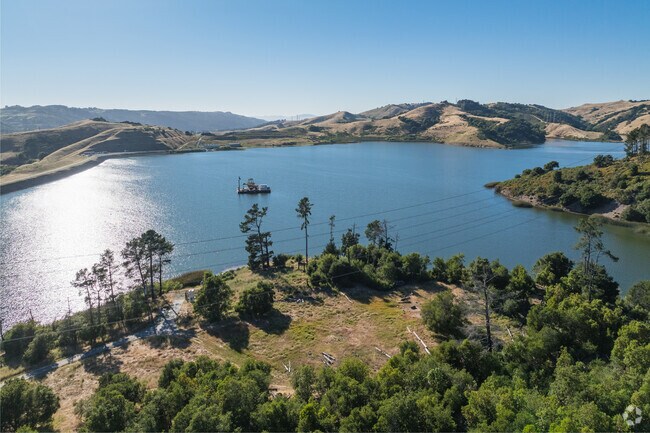 The serene waters of Briones Reservoir reflect the peaceful ambiance of Sleepy 
Hollow-Orinda.