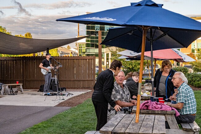 Locals love the live music and laid back vibes at The Barn near the Willamette River.