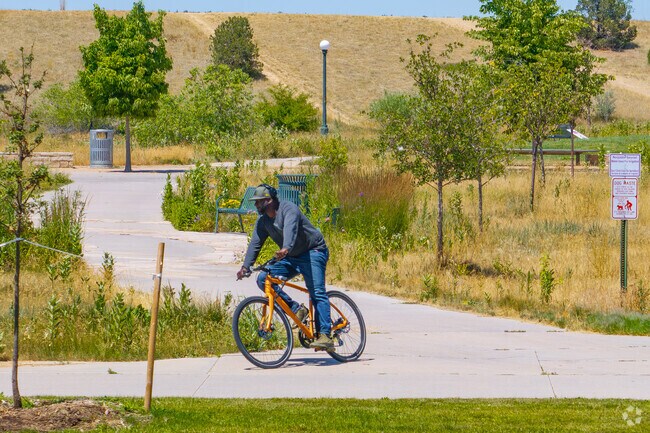 The trail system at Central Park in Denver makes it easy to bike from park to park.