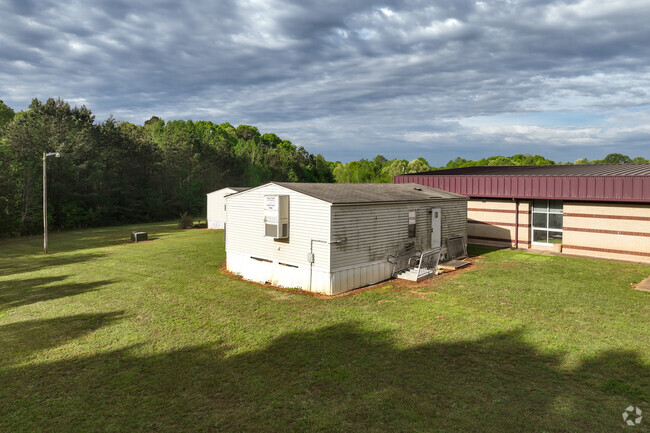 There's a few mobile classrooms on the campus of Pumpkin Center Intermediate.