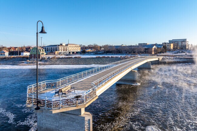 De Pere Riverwalk pier jutts out into the Fox River.