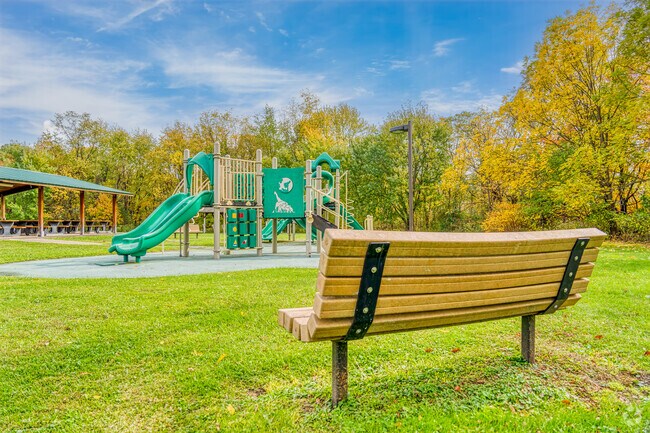 Edward Gratty Park offers a playground and a spot for parents to watch their kids in Conway, PA.